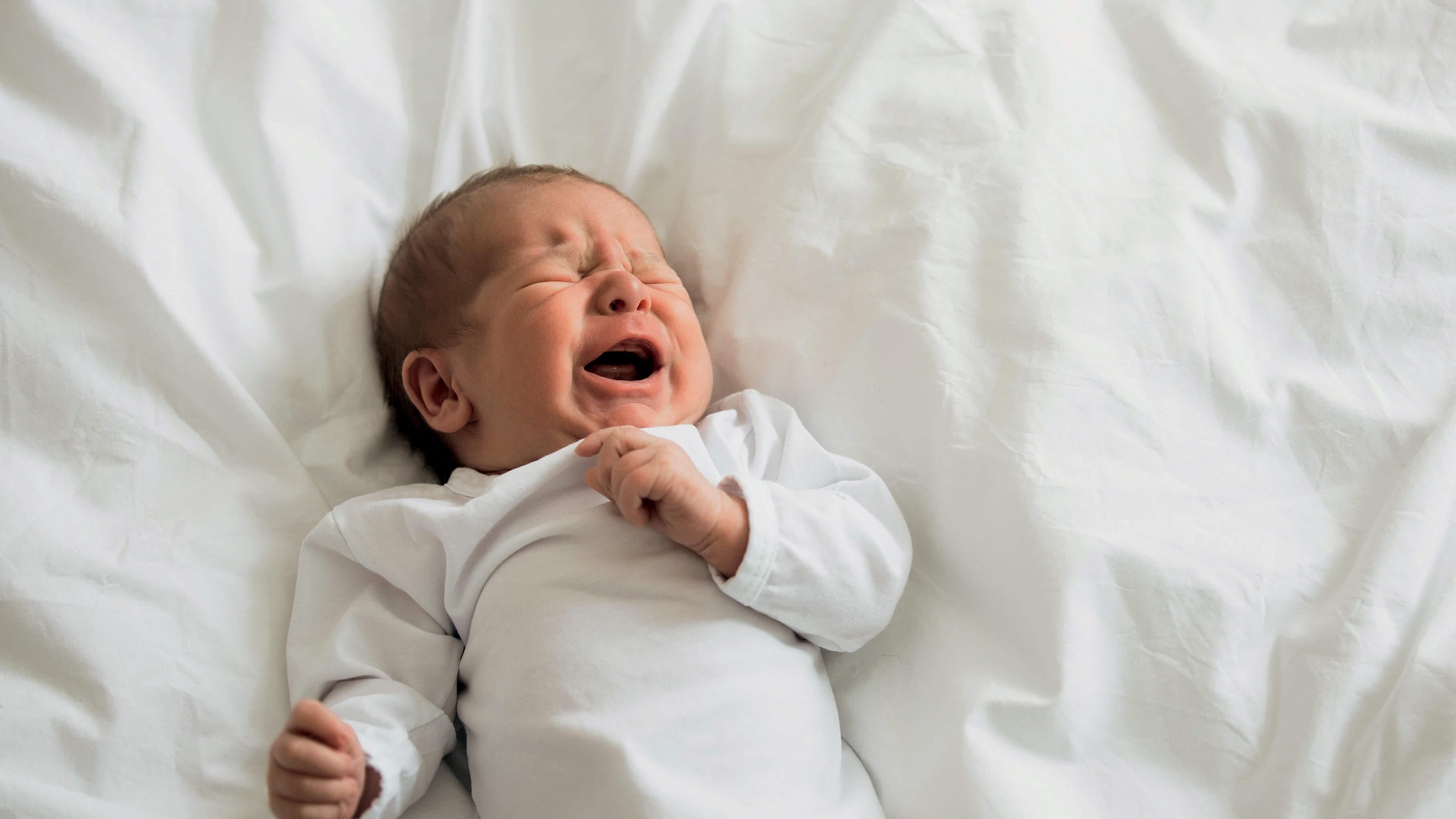 Image for Baby cries in their sleep - common causes and tips